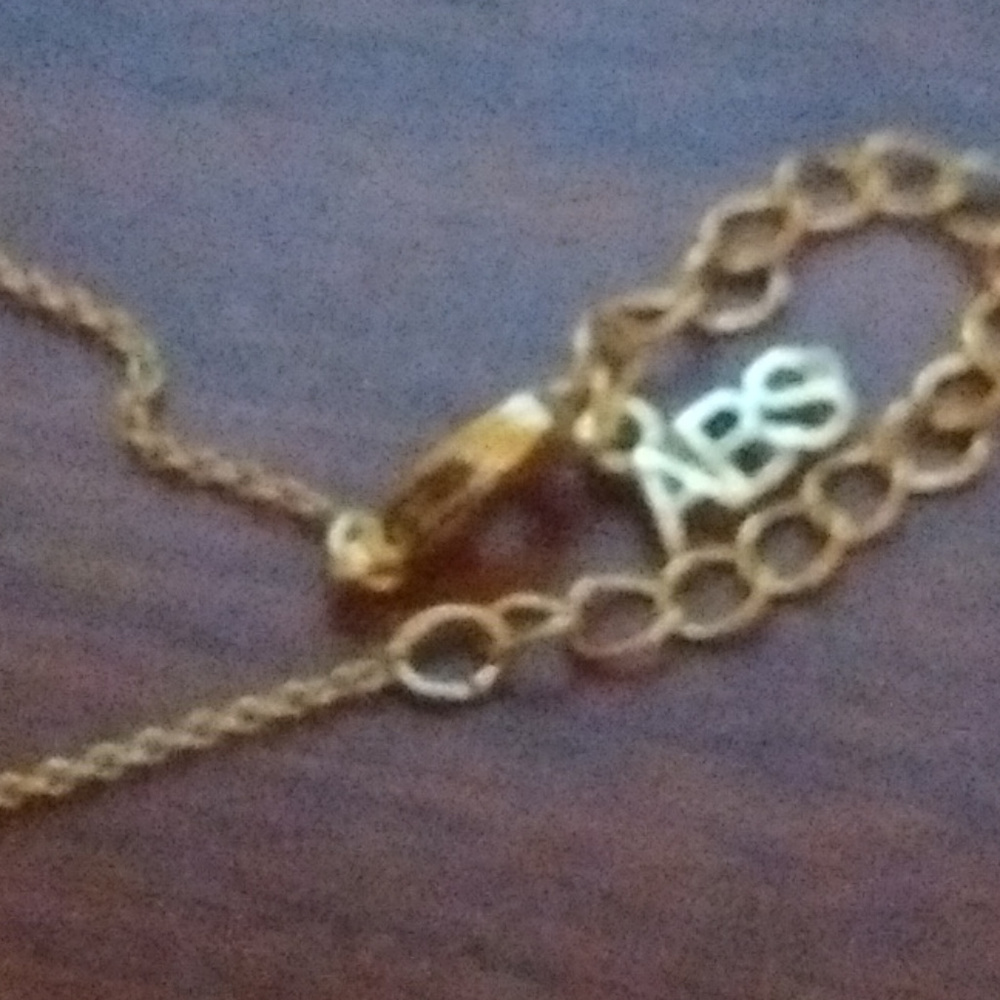 ABS 2 interlocking circles gold necklace. - Picture 5 of 7